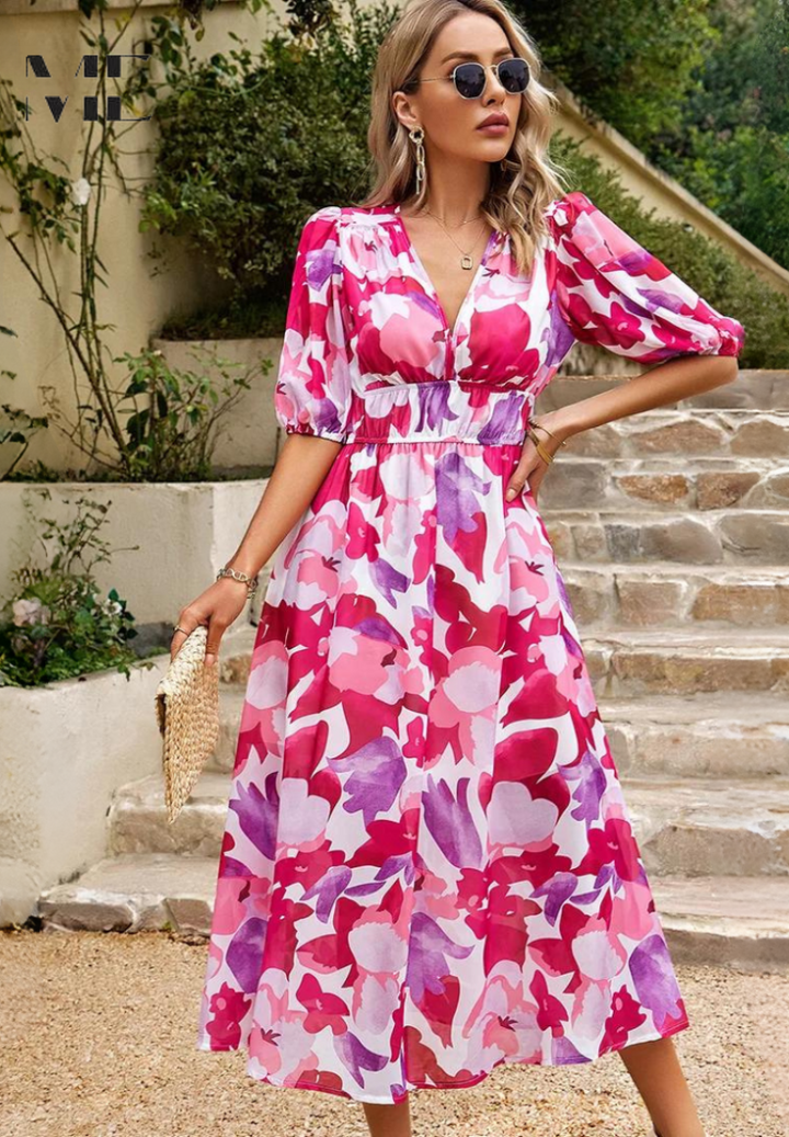 Vivid floral print on a women's A-line midi dress, a short sleeve design perfect for stylish summer looks.