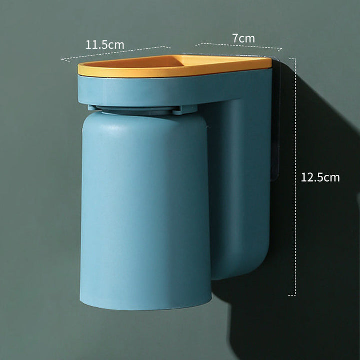 Stylish white wall-mounted organizer for toothbrushes and rinse cups in a home bathroom.
