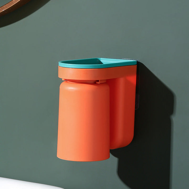 Functional wall-mounted dental care holder, keeping toothbrushes and cups tidy and accessible.
