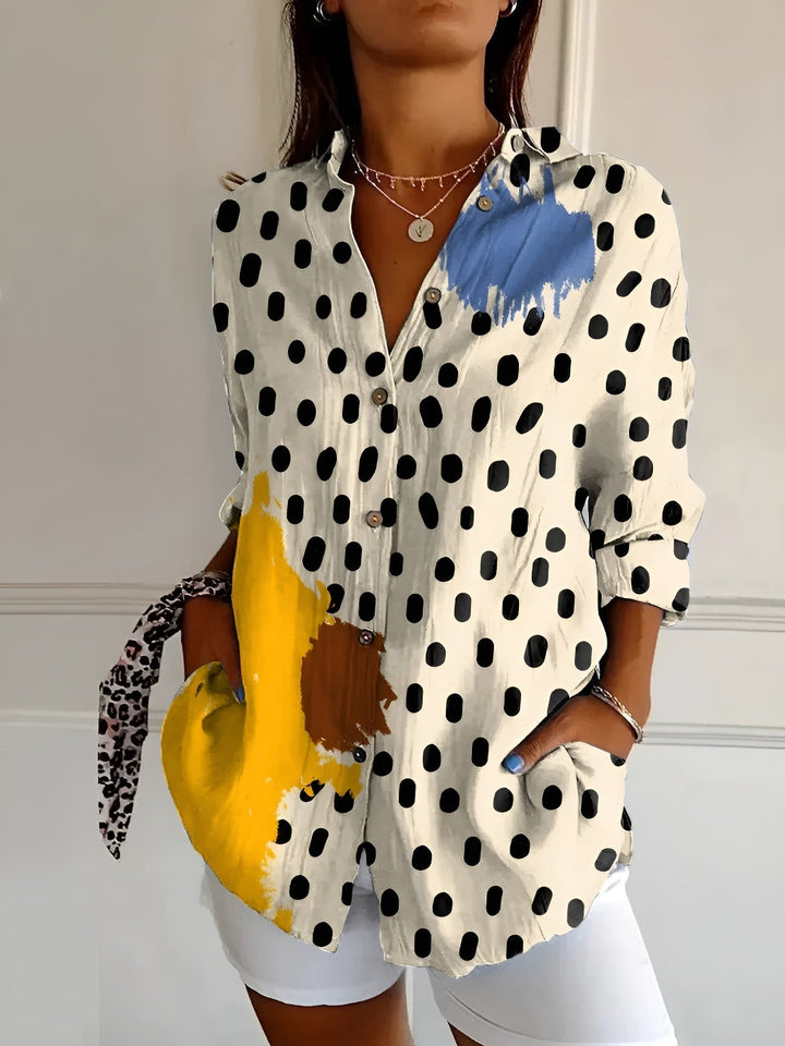 Make a statement with this women's abstract print split-neck blouse. Long sleeve, elegant & versatile.