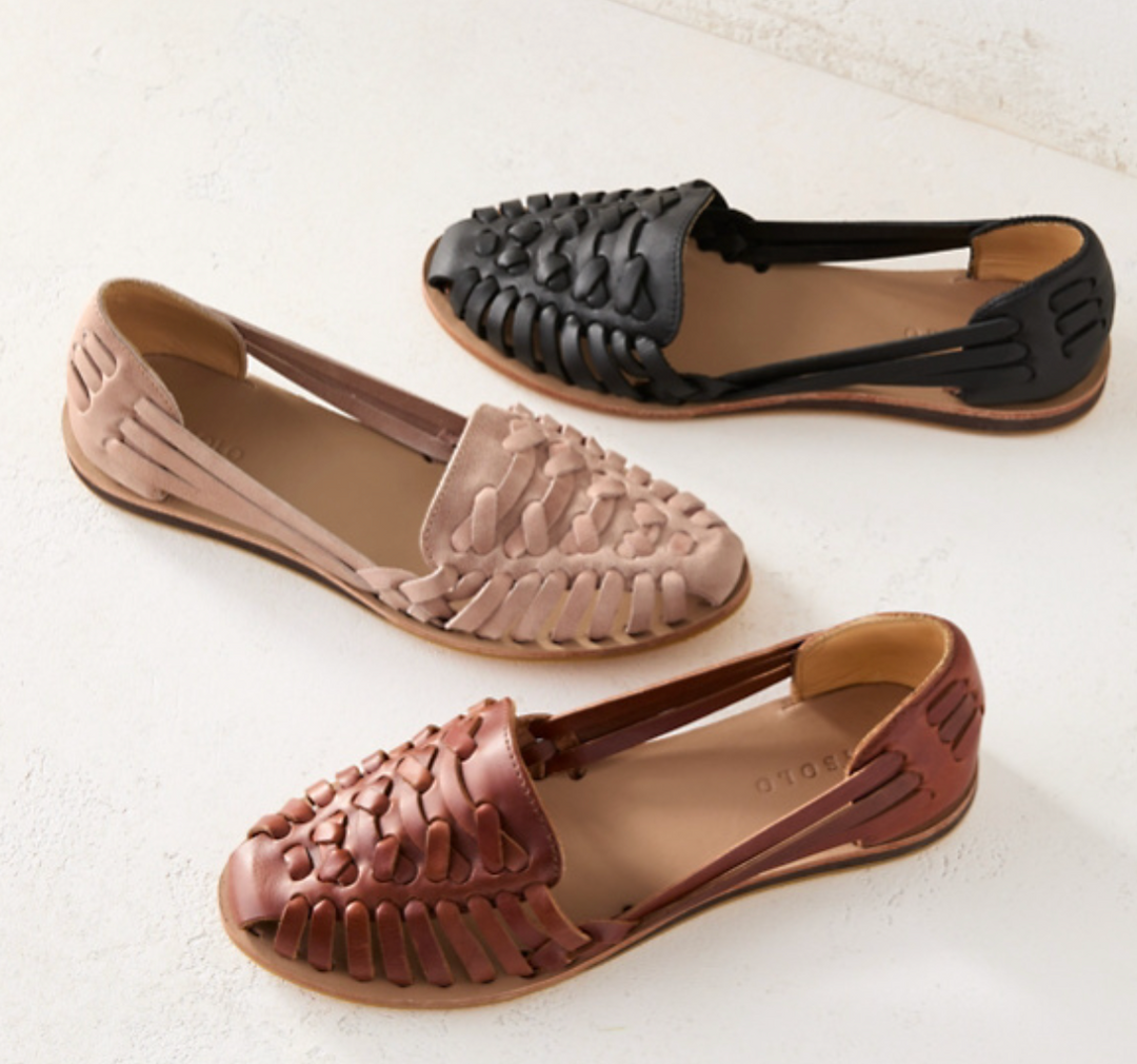 Pair of women's casual open-toe sandals, a comfortable and stylish option for warm weather.