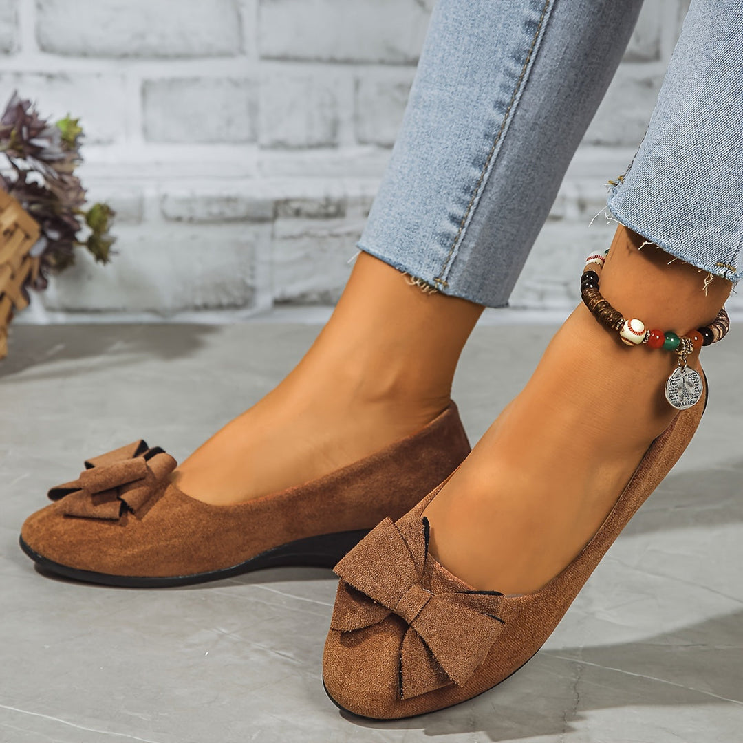 Gray elegant orthopedic flats for women, versatile daily wear.