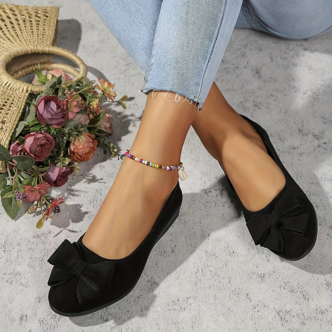 Stylish gray orthopedic flats for women, versatile daily wear comfort.