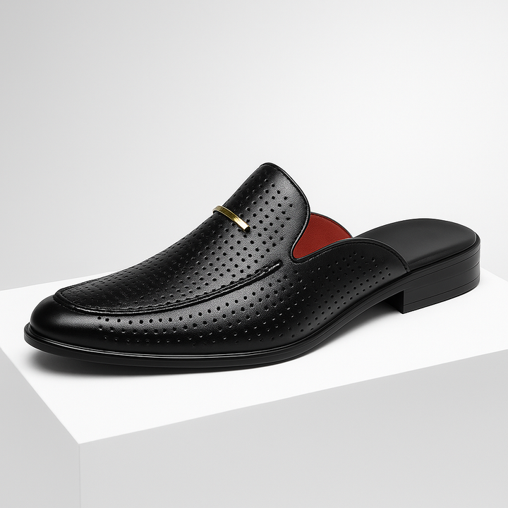 Casual women's footwear: white perforated leather mules with a comfortable design