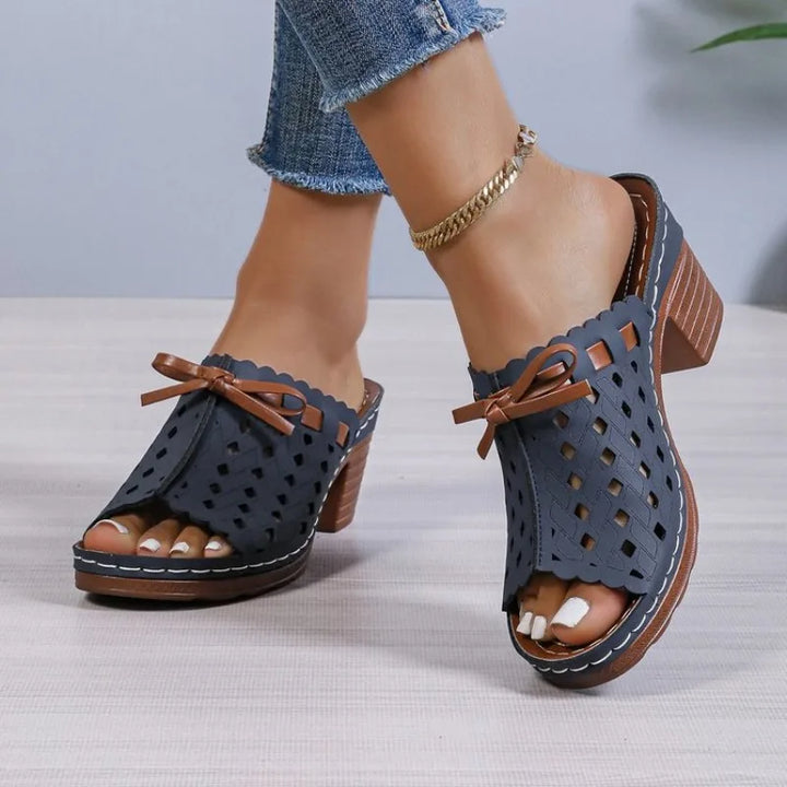 Open-toe cutout block heel mules for women, ideal for casual wear and summer outfits.