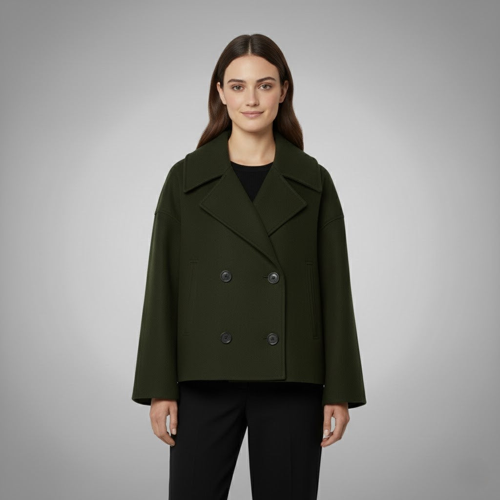 Fashion-forward women's short jacket, tailored with double buttons, a timeless outerwear piece.