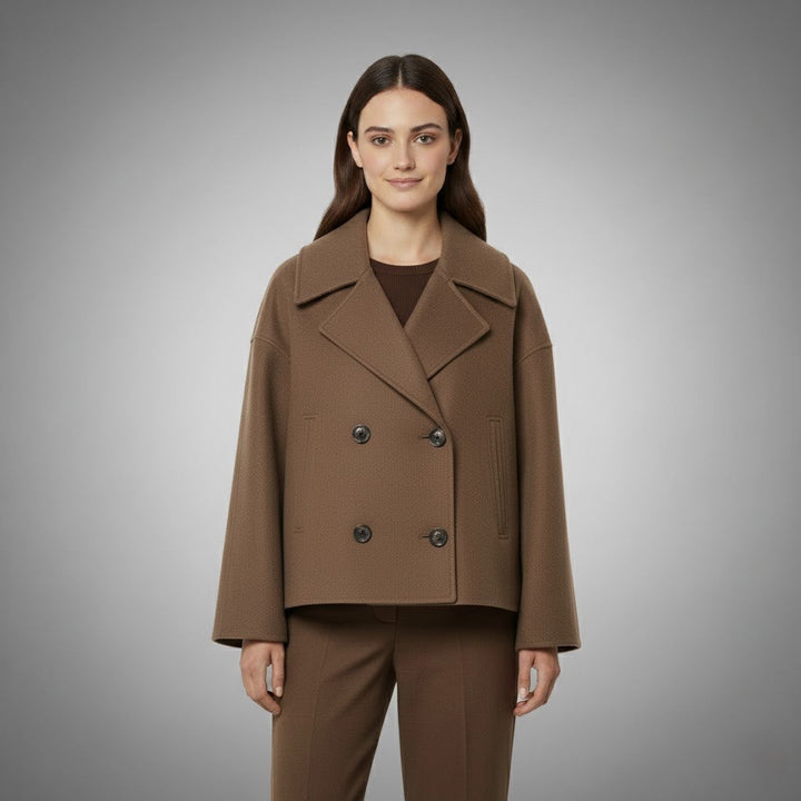 Women's versatile short jacket with double buttons, perfect for layering and sophisticated fashion.