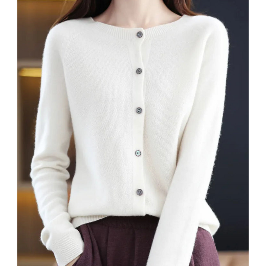 Elegant women's classic knitwear: merino wool long sleeve sweater with functional button front.