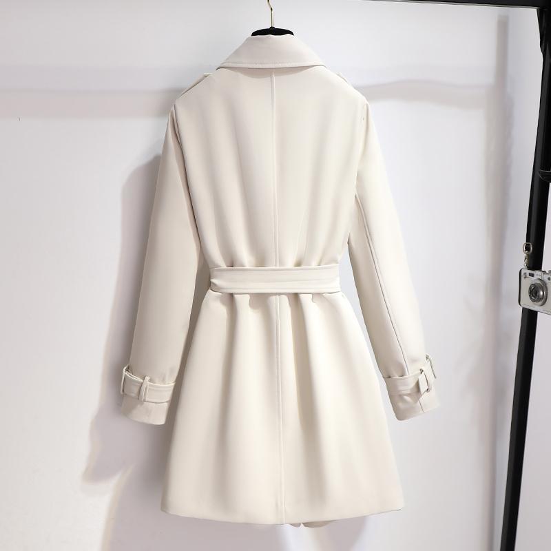 Sophisticated women's long sleeve white trench coat with a belt and classic lapel detailing
