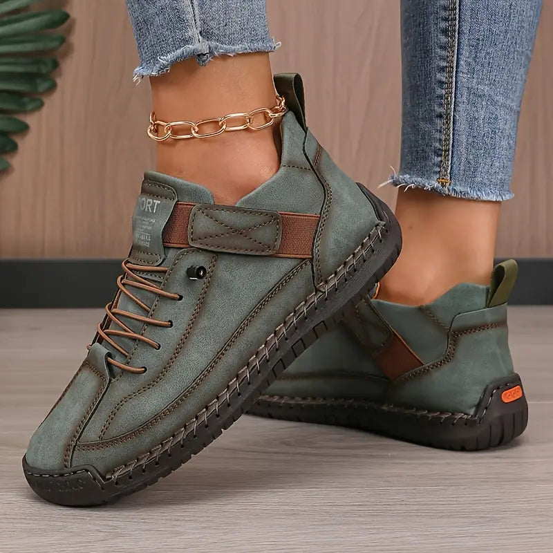 Side profile of a comfortable women's walking sneaker, highlighting its ergonomic sole design.