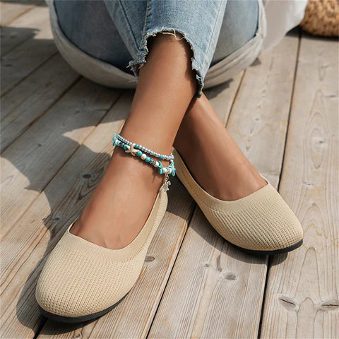 Women's comfortable pink ballet flats, perfect for spring casual wear.