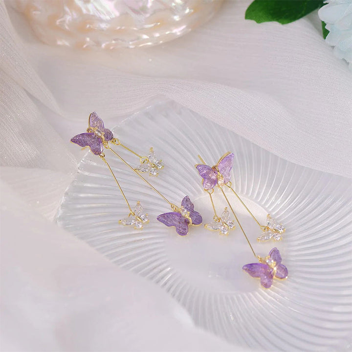 Pair of women's fashion crystal butterfly tassel hook earrings, sparkling clear gems, trendy