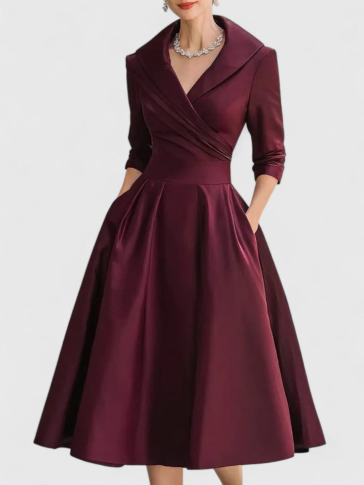 Comfortable women's elegant midi dress with functional pockets for everyday chic or special events.