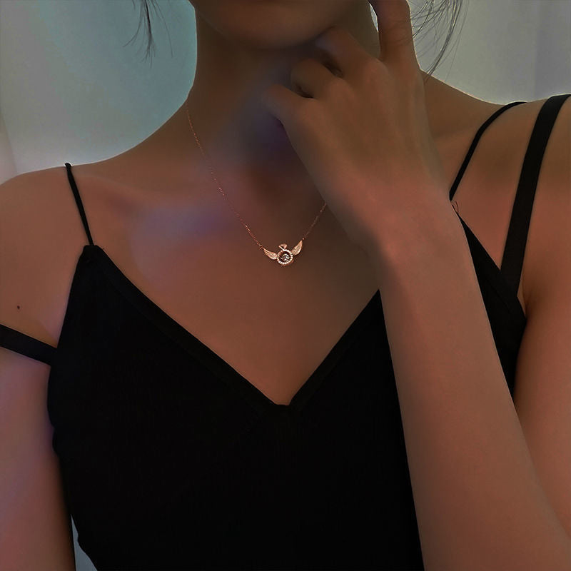 Elegant women's white gold angel wing necklace made from high-quality titanium steel.