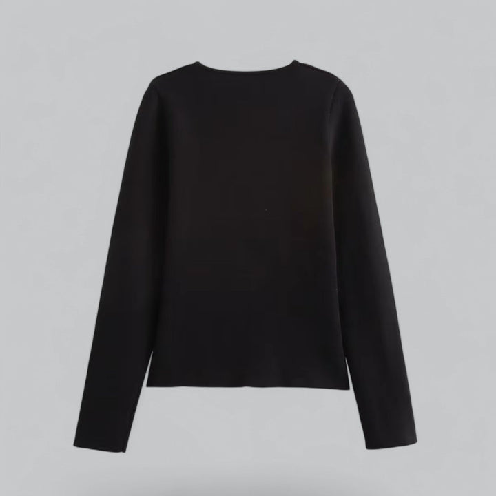 Minimalist women's knit cardigan with classic buttons, versatile for casual or elegant summer wear.