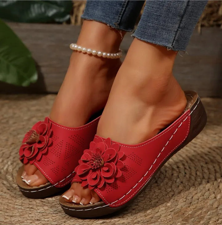 Women's casual slide sandals with an artistic floral design, great for gifting or personal use