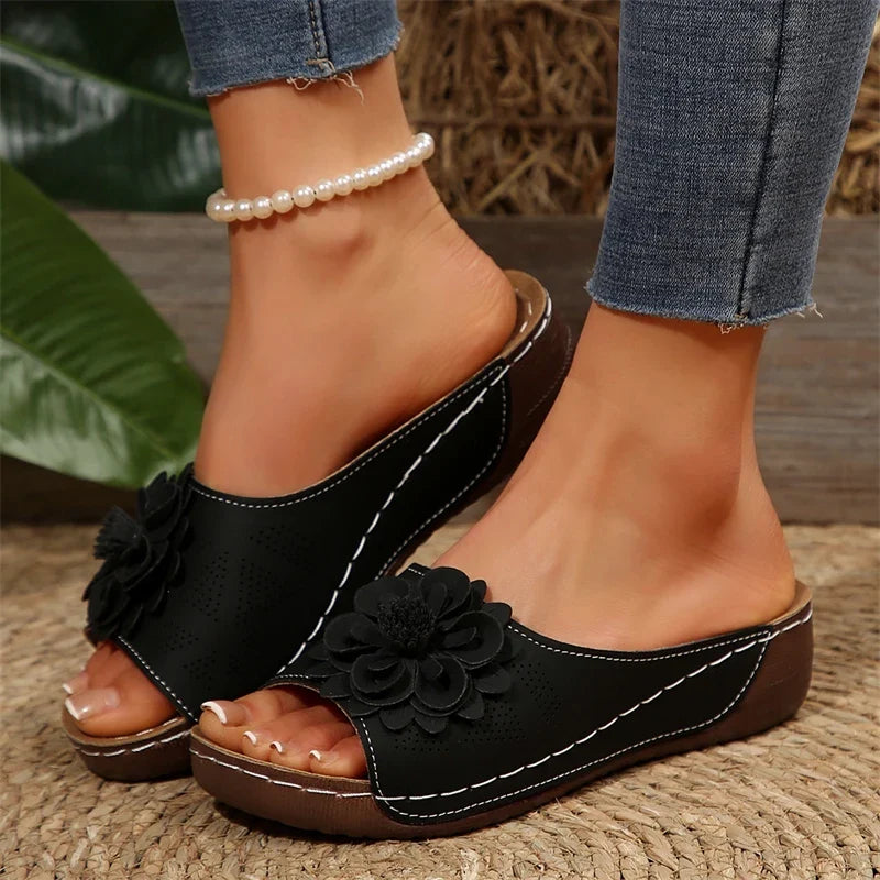 Pair of Women's Floral Comfort Slide Sandals, slip-on style, offering ultimate summer footwear ease