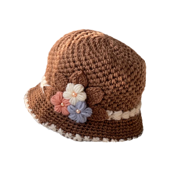 Stack of colorful women's floral knit wool beanies, variety of winter hats