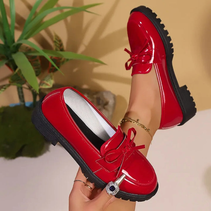 Fashionable women's slip-on patent leather loafers, suitable for everyday elegance