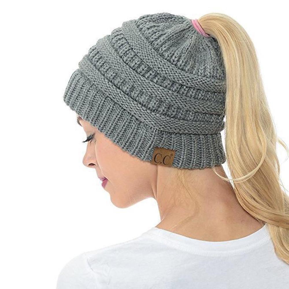 Side profile of a Women's Winter Beanie Hat designed for ponytails, in a stylish knit pattern