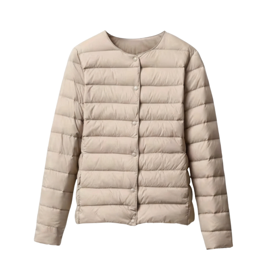 Close-up of the quilting detail on a women's lightweight spring puffer, highlighting the texture.