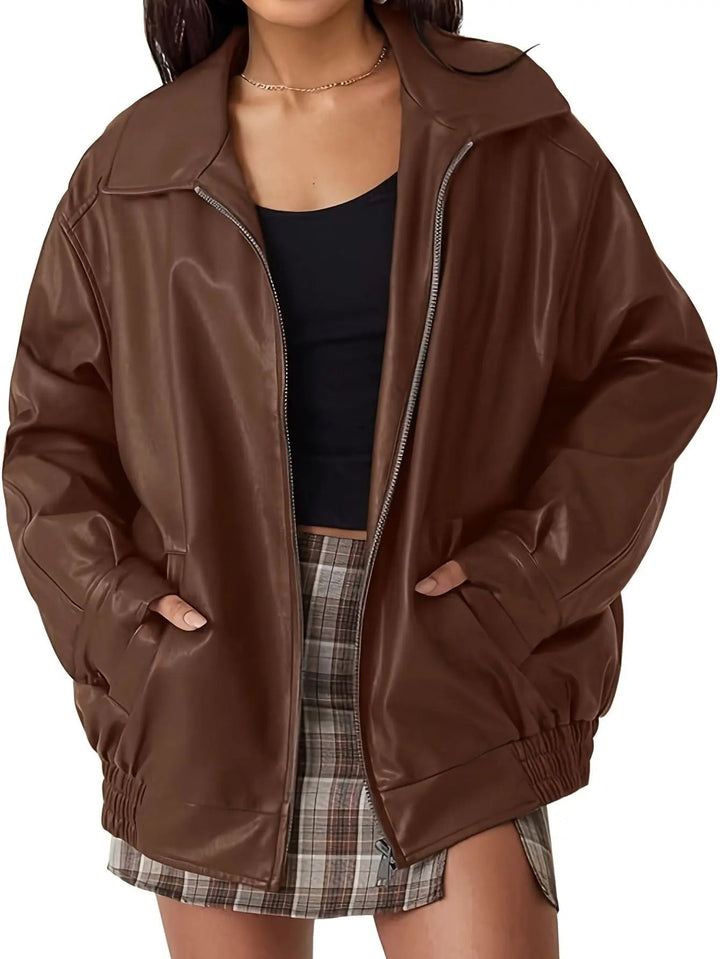 Women's oversized faux leather bomber jacket in black, a chic and casual outerwear piece for fall fashion.
