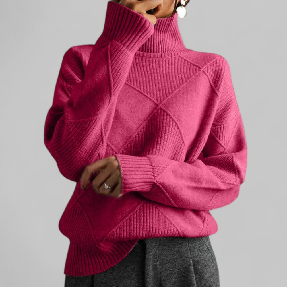 Elegant women's oversized patterned turtleneck sweater, a versatile piece of warm knitwear.
