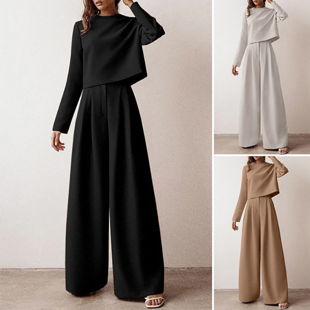 Versatile women's two-piece with a relaxed cropped top and fashionable wide-leg trousers.