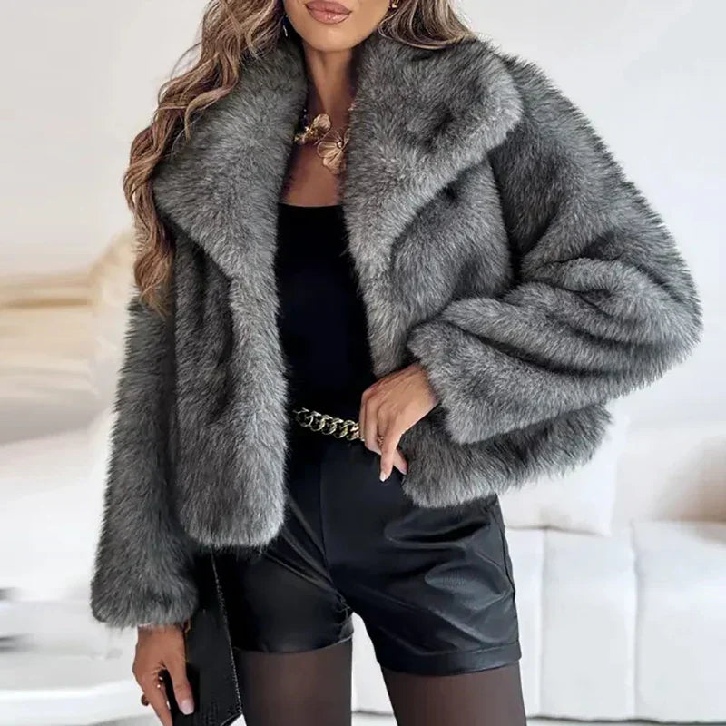 Close-up of the luxurious faux fur texture on a women's relax fit winter jacket, very cozy