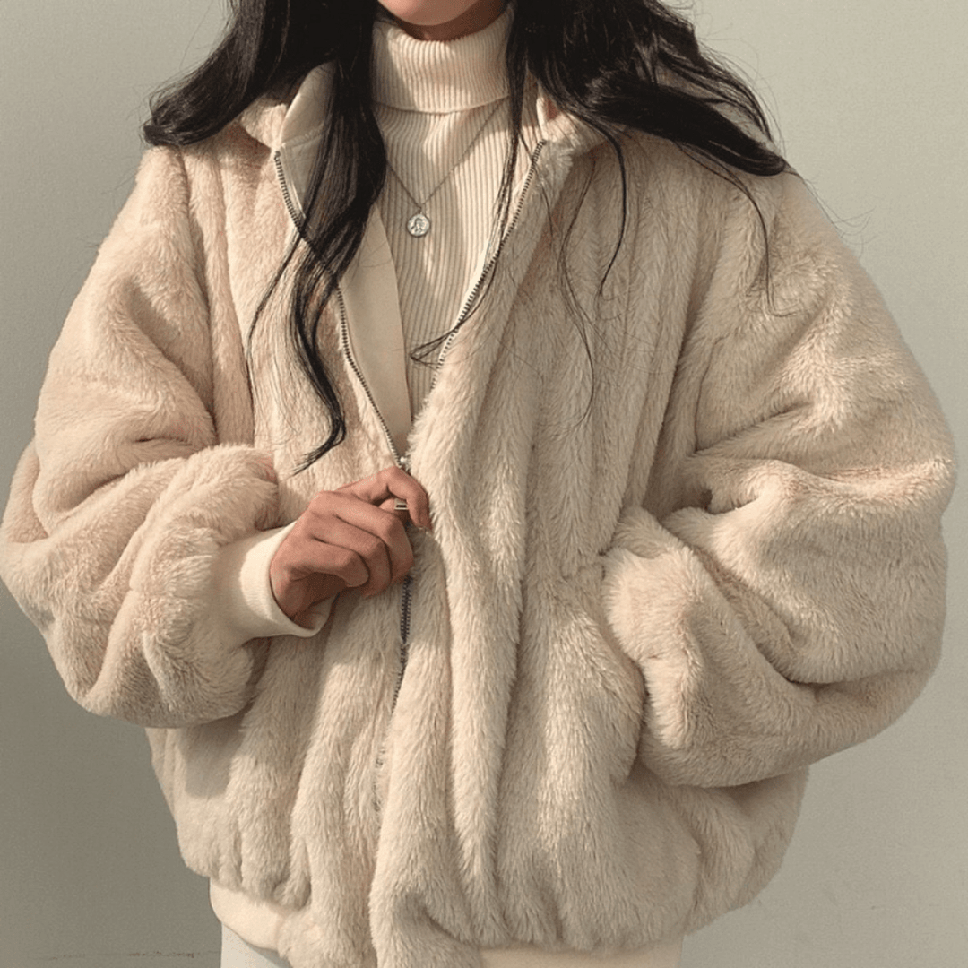 Warm winter outerwear for women, burgundy, with a relaxed fit and practical side pockets.