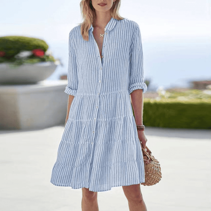 Versatile women's striped button-front mini dress, a chic collared summer style with a playful tiered skirt.