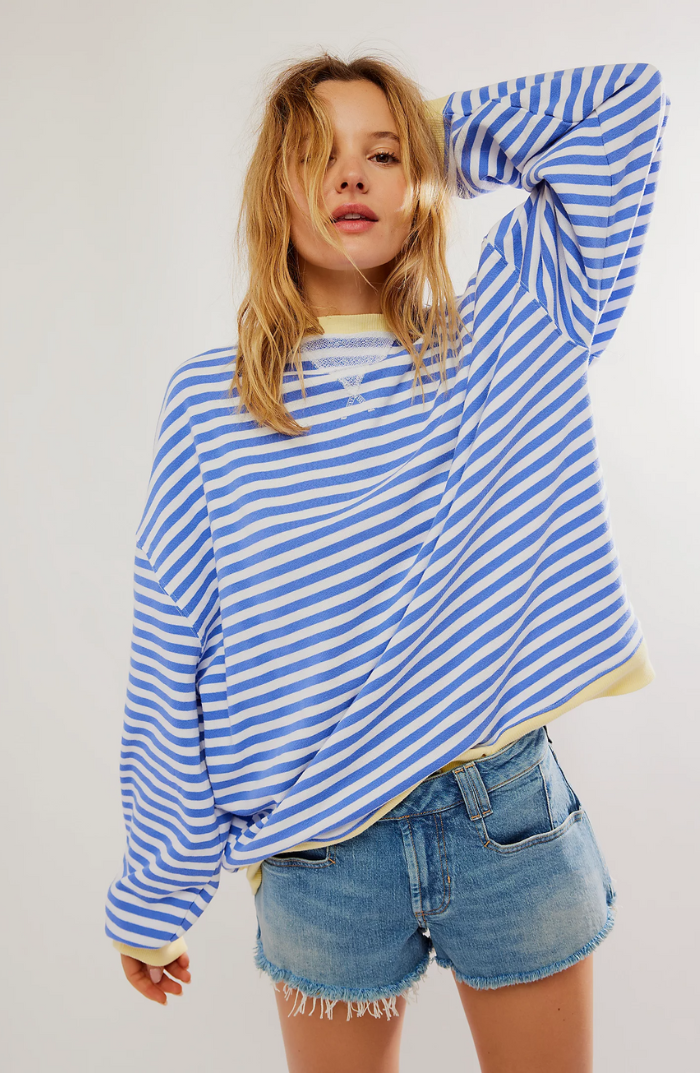 Relaxed fit women's striped sweater with a classic crewneck, perfect casual knitwear