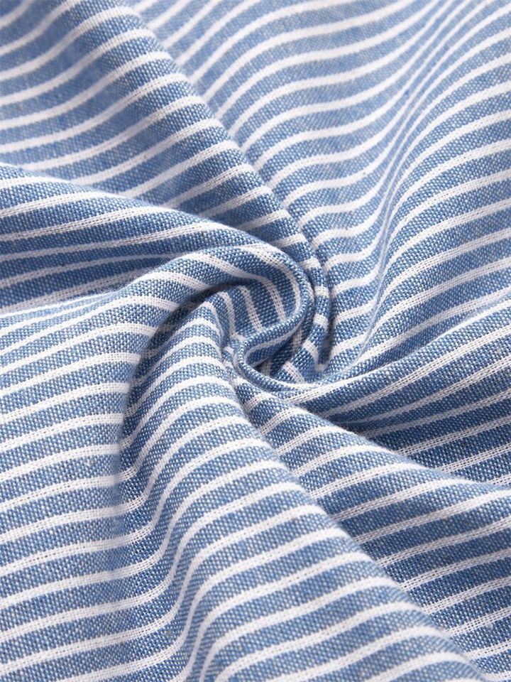 Stylish striped midi dress for women, featuring button accents & pockets. Ideal for casual outings or work.