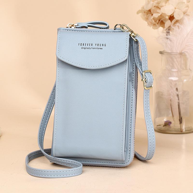 Trendy women's crossbody wallet, showcasing its secure magnetic snap closure