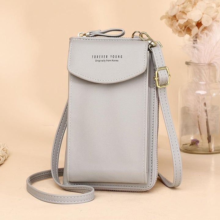 Gift-ready women's portable crossbody wallet, presented in a clean, professional setting