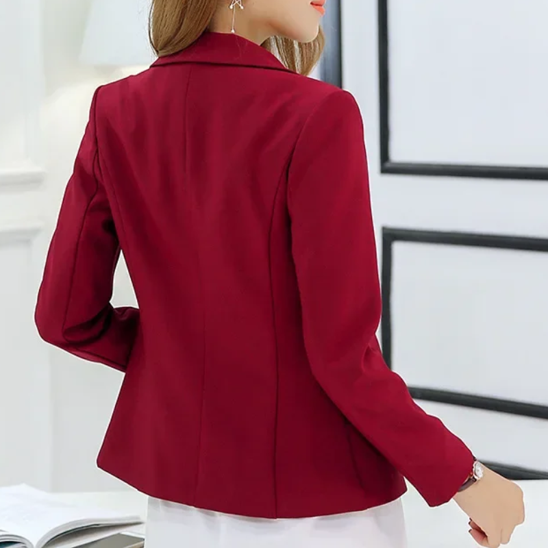 Elegant women's slim fit blazer, ideal for office attire, featuring a sophisticated tailored jacket design.