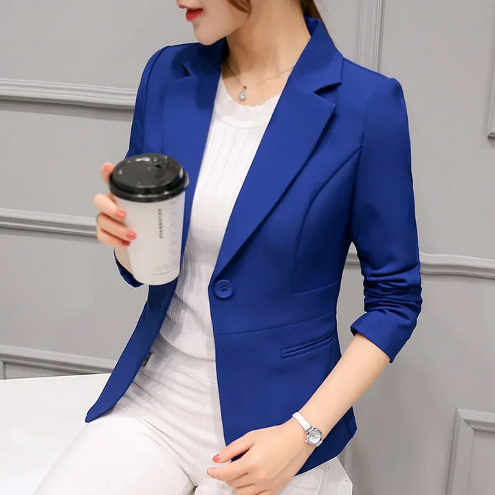 Side view of a tailored women's blazer, showcasing its sleek slim fit and professional workwear style.