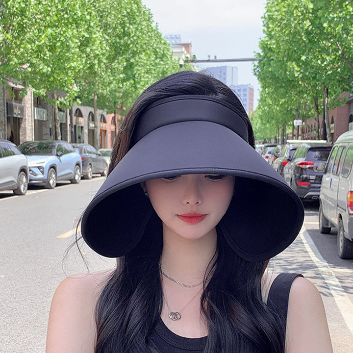Women's sun hat, wrap-around style, UV protection, fashion accessory for beach & outdoor