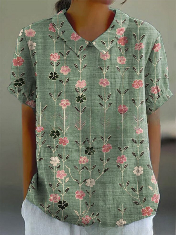 Casual short sleeve floral print blouse for women, embroidered details, perfect for a summer look.