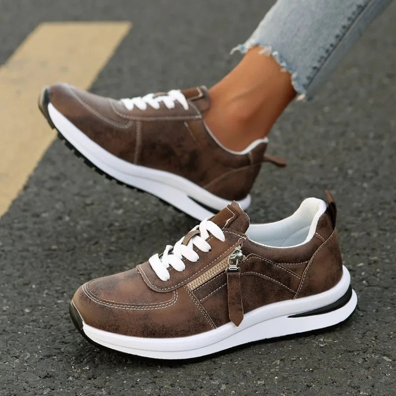 Women's vintage-style runners with distressed look, perfect for everyday casual wear and comfort.